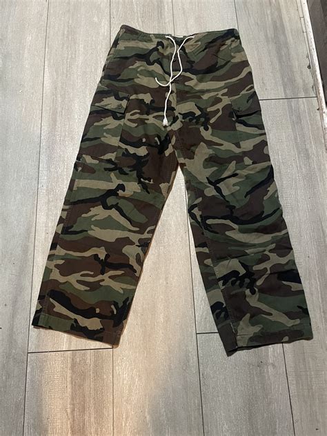 celine camo pants|celine pants and shorts.